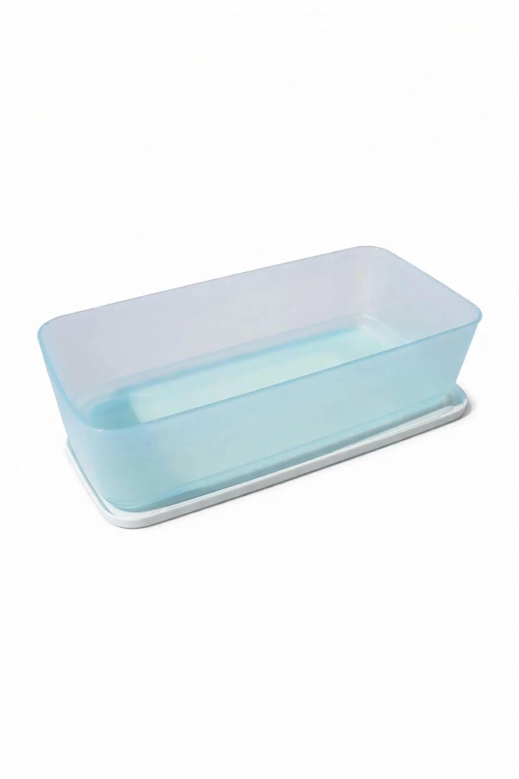 Rectangular translucent blue silicone loaf pan with white base, kitchen baking tool