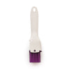 White silicone kitchen brush with purple bristles, ideal for baking or cooking tasks