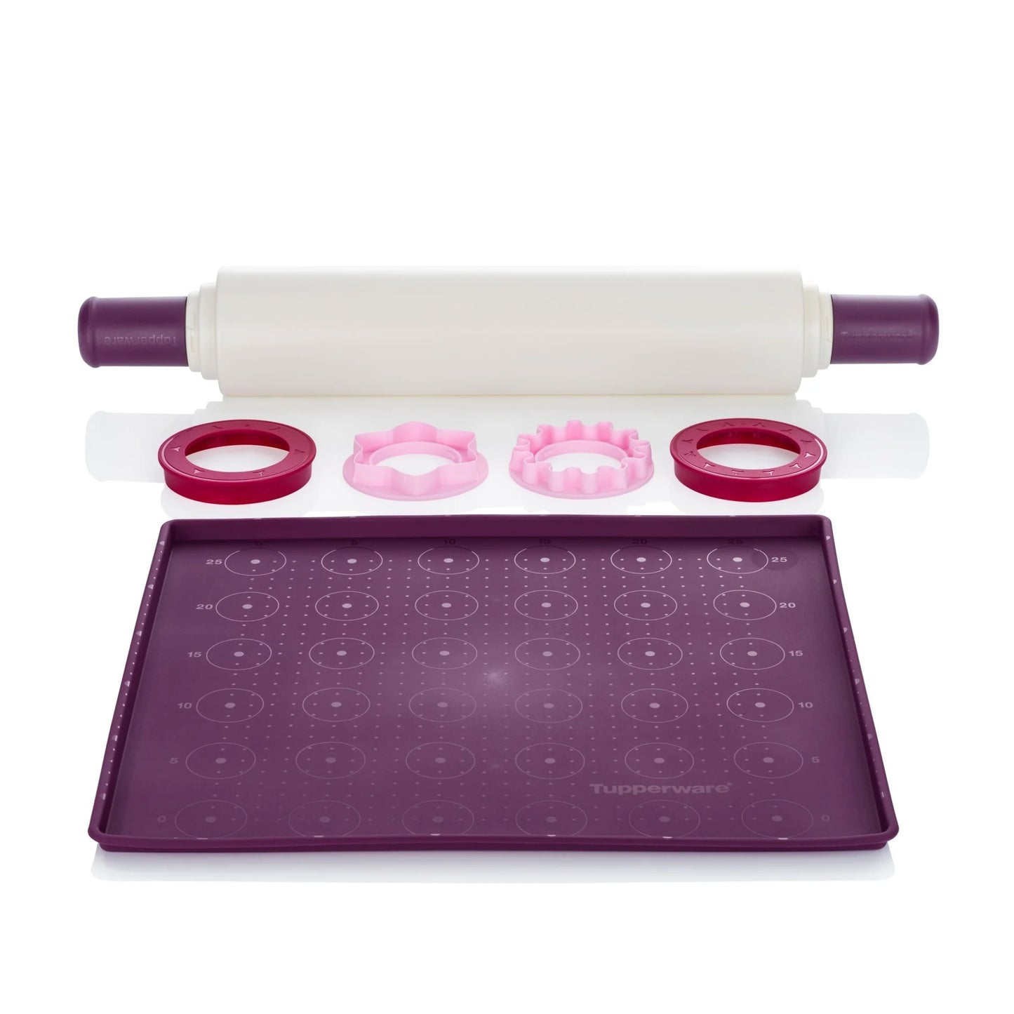 Nonstick pastry mat, rolling pin, and assorted cookie cutters in purple and pink kitchen set.
