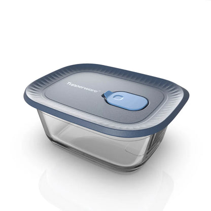 Rectangular food storage container with blue airtight lid and clear base