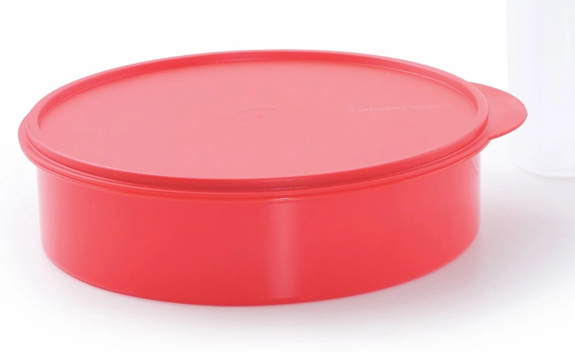 Red round plastic food storage container with matching airtight lid