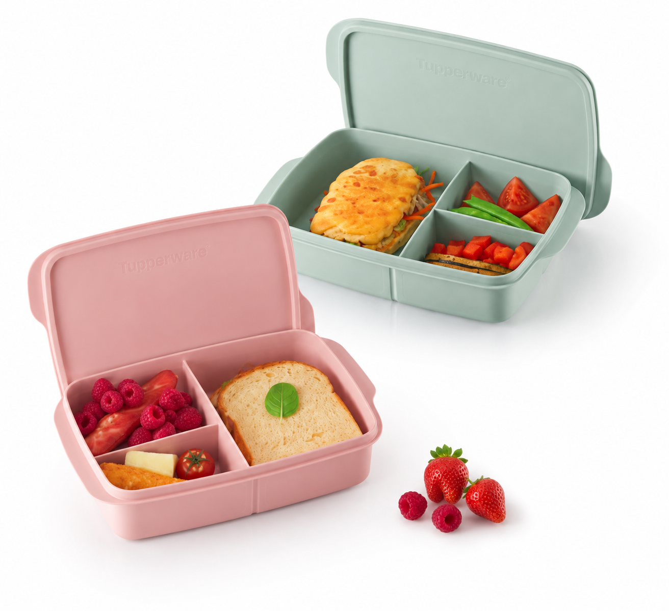 Roze en mintgroene Tupperware lunchboxen met vakken, gevuld met gezonde snacks en fruit voor kinderen