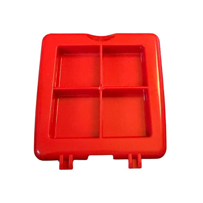 Red plastic kitchen tool with four square compartments, perfect for food prep or portioning