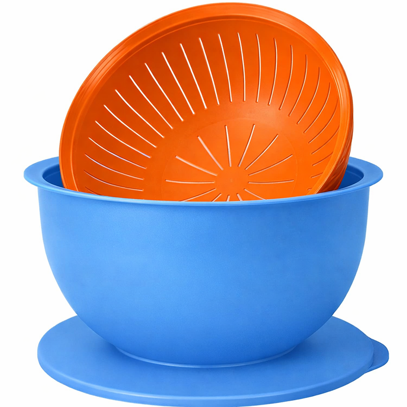 Blue mixing bowl set with orange colander for kitchen prep and food straining