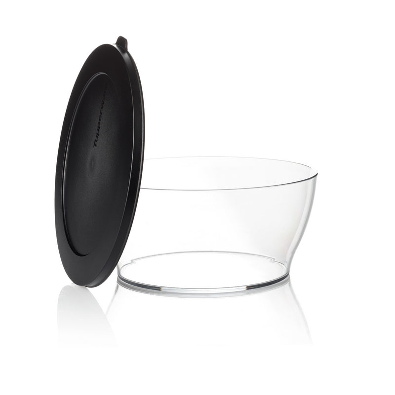 Clear plastic kitchen storage bowl with black lid, perfect for food organization