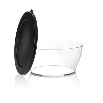 Clear plastic kitchen storage bowl with black lid, perfect for food organization