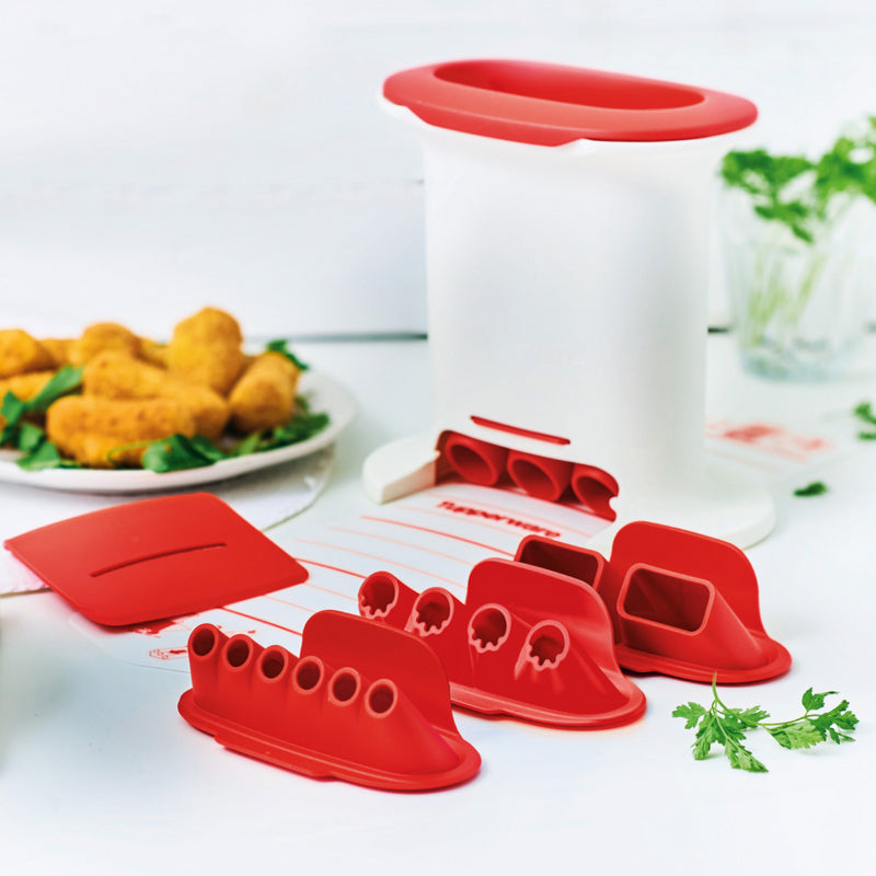 Red and white kitchen tool set with interchangeable slicing attachments on a countertop