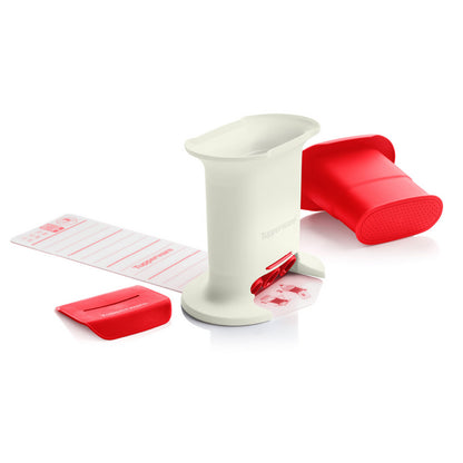 Tupperware kitchen tool set in red and white, including a slicer and measuring sheet for cooking prep