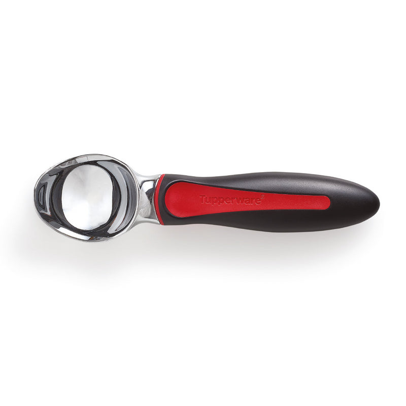 Stainless steel ice cream scoop with black and red ergonomic handle on white background