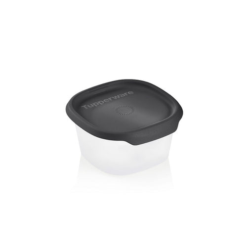 Plastic food storage container with black lid on white background