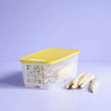 Tupperware VentSmart 6.1L container with yellow lid filled with white asparagus