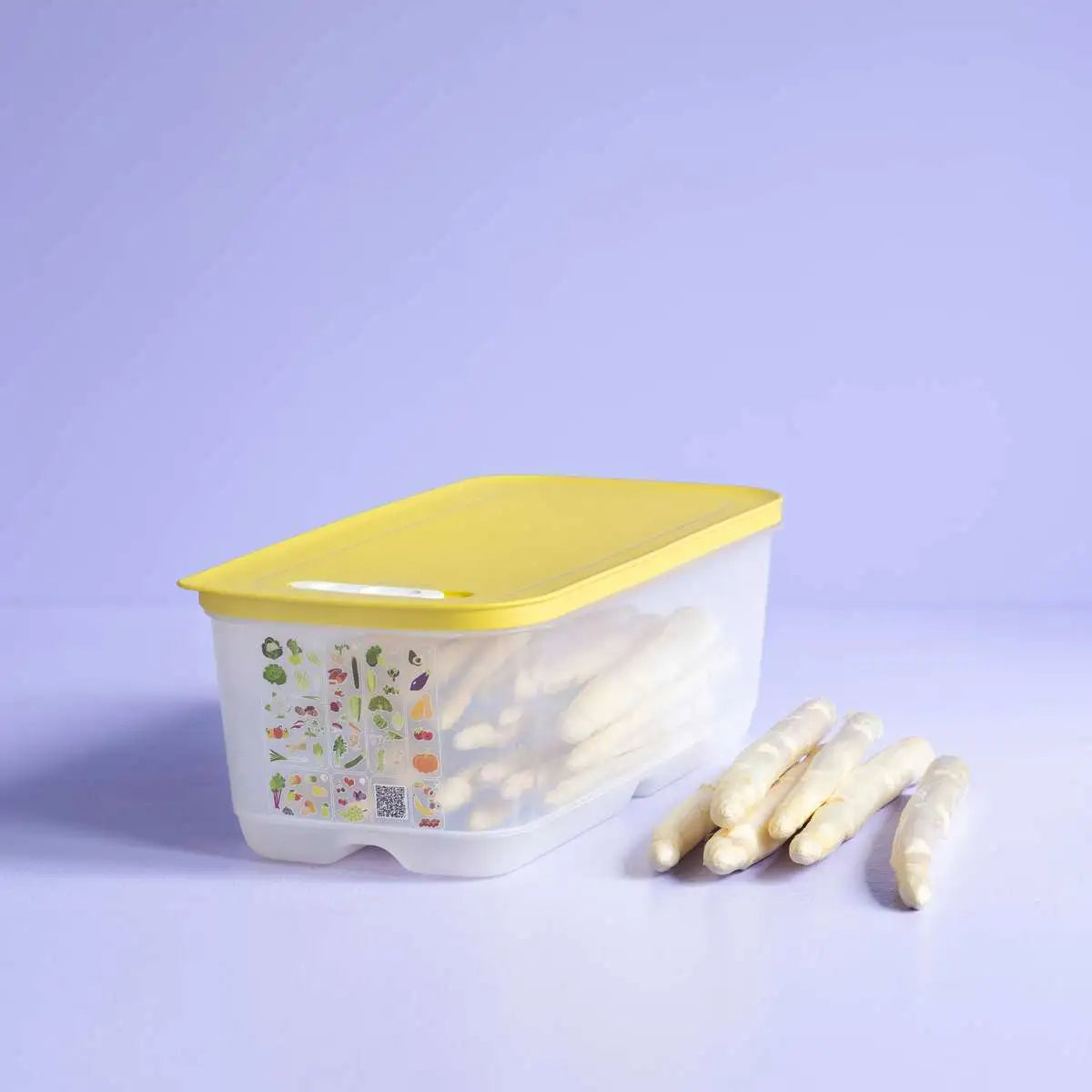 Tupperware VentSmart 6.1L container with yellow lid filled with white asparagus