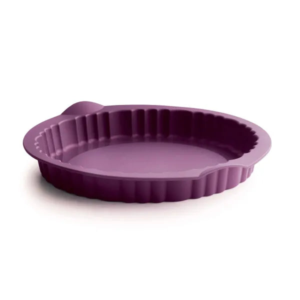 Purple silicone quiche pan with fluted edges for baking tarts and quiches