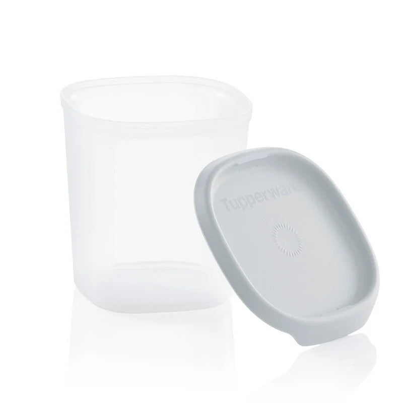 Clear plastic food storage container with white lid for kitchen organization