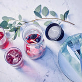 Tupperware Hydrolife 360 Karaf filled with infused water, berries and apple slices.