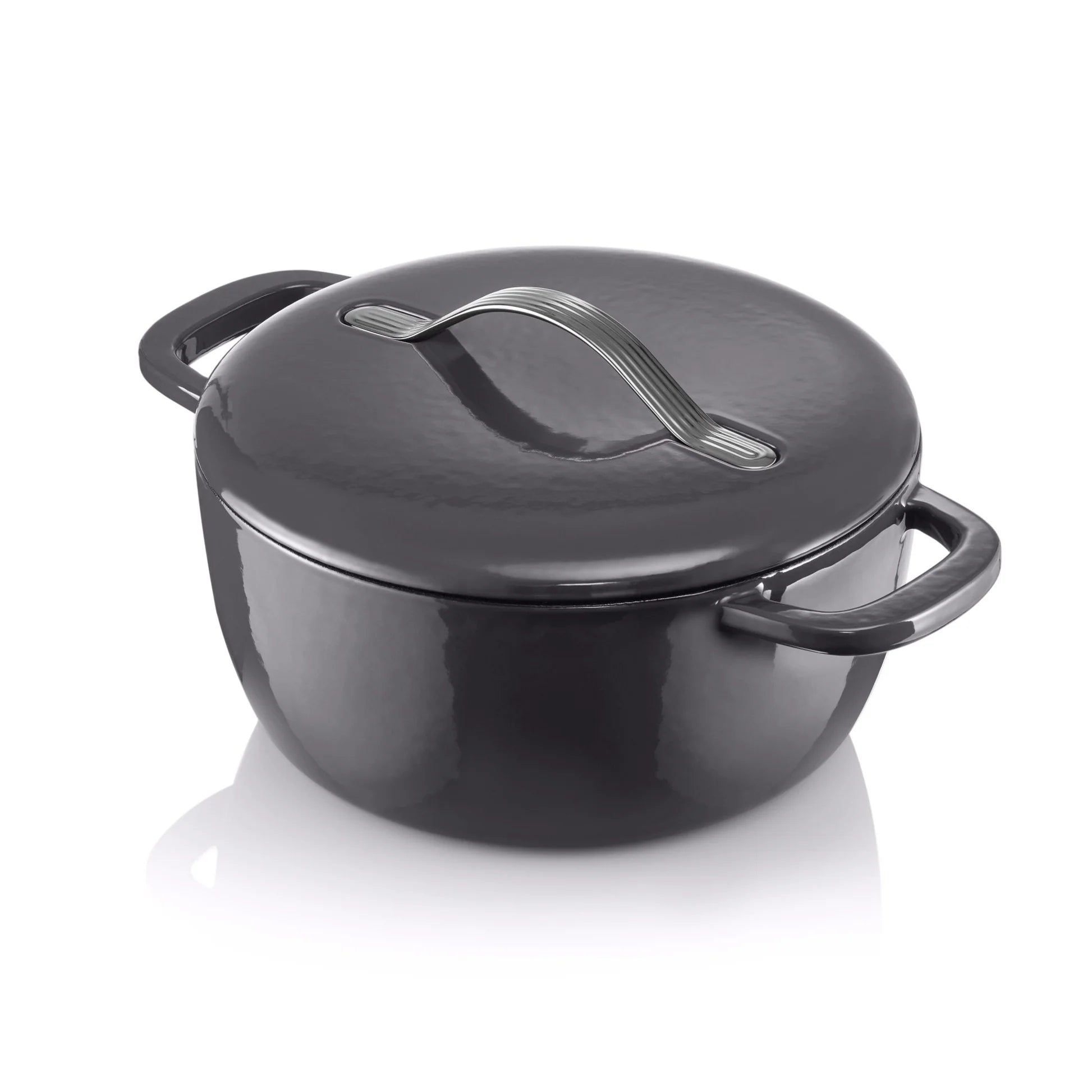 Black cast iron casserole dish with lid and handles on white background