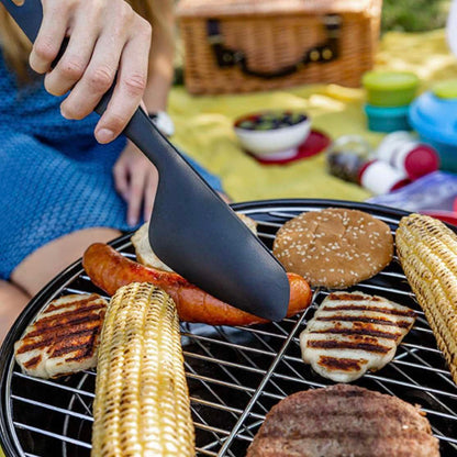 Grillspatel voor perfect gegrilde hamburgers, mais en worstjes tijdens een picknick