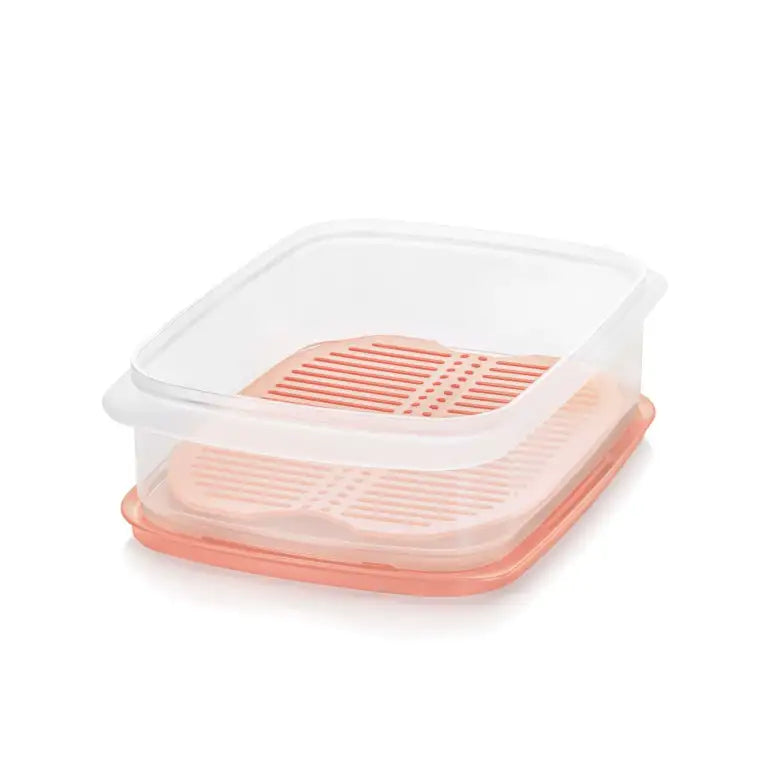 Roze en transparante voedselopslagbox met rooster voor keuken, perfect voor frisse groenten en fruit