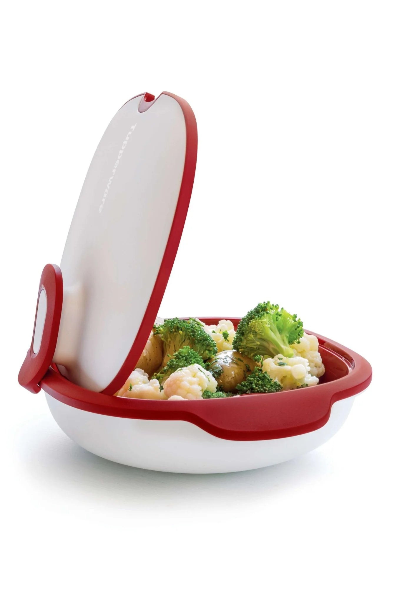 Rode en witte Tupperware stoommand met broccoli, bloemkool en aardappels voor gezond koken