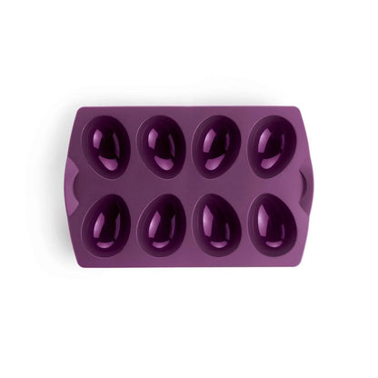 Purple silicone egg mold tray with eight oval cavities for baking or chocolate making