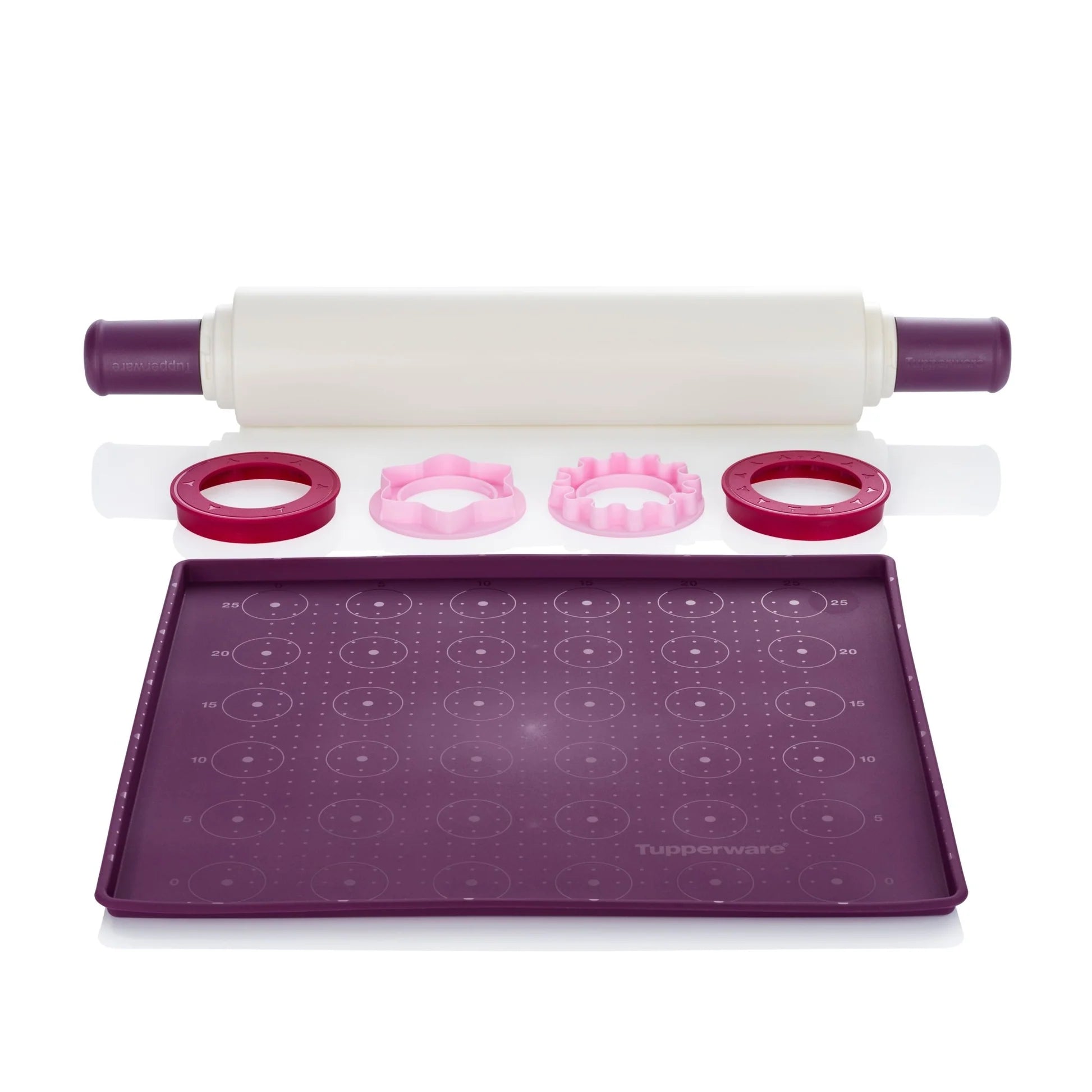Nonstick pastry mat, rolling pin, and assorted cookie cutters in purple and pink kitchen set.