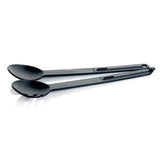 Black plastic salad tongs kitchen utensil on white background