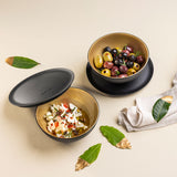 Set of two Tupperware Allegra bowls with lids containing olives and feta cheese appetizers.