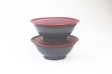 Set of two Tupperware Allegra bowls in grey with burgundy lids, stacked on a white background.