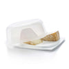Plastic cheese storage container with lid holding cheese wedges on a white background