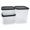Set of three white Tupperware Cubix food storage containers with black lids in various sizes.