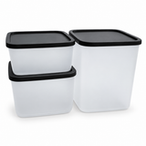 Set of three white Tupperware Cubix food storage containers with black lids in various sizes.
