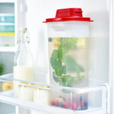 Tupperware square 2L refrigerator pitcher with red lid and infused water in a fridge
