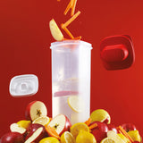 Tupperware square refrigerator pitcher with fruit and vegetables on a red background