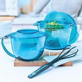 Blue mixing bowls with lids and black whisk on kitchen counter, premium kitchen tools