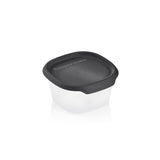 Plastic food storage container with black lid on white background