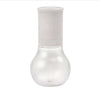 Tupperware spice mill with white top and clear rounded glass base