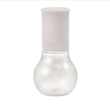 Tupperware spice mill with white top and clear rounded glass base