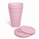 Set of two pink Tupperware straw cups with matching lids on a white background.