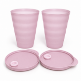 Set of two pink Tupperware straw cups with matching lids