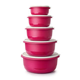 Stack of five nesting Tupperware Ultimate Mixing Bowls in vibrant pink with white lids