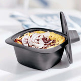 Tupperware UltraPro Cocotte 500 ml containing a baked dish topped with coconut slices