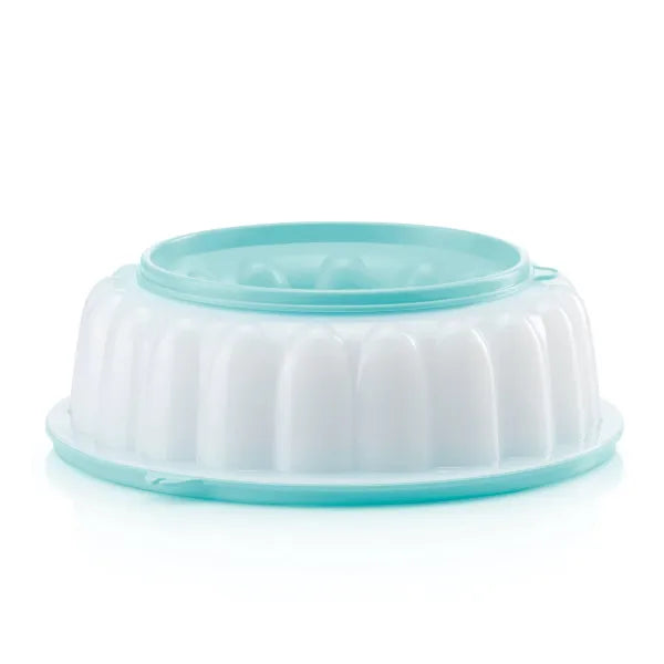 Plastic jelly or cake mold with light blue lid on white background