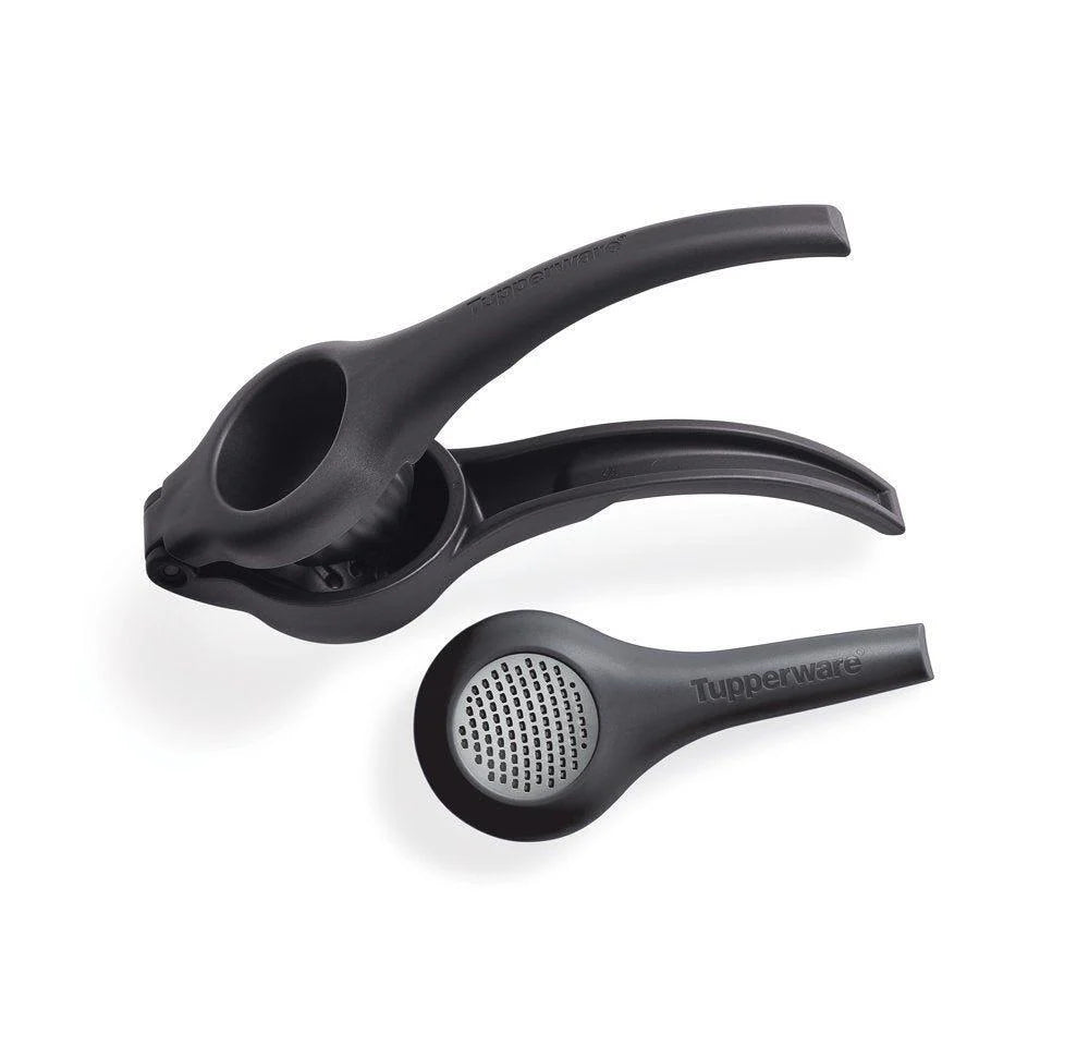 Black Tupperware citrus press and zester kitchen tools on white background